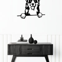 Picture frame above a wooden sideboard